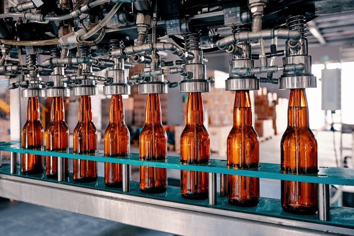 beer-bottles-being-filled